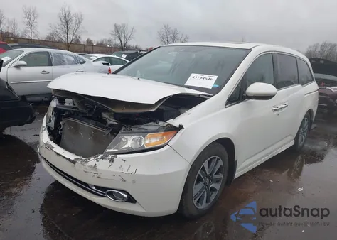 2014 Honda Odyssey Touring/Touring Elite from USA, damaged, VIN 5FNRL5H90EB084005